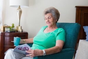 elder women reading a magazine