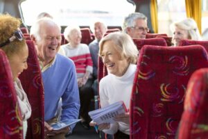 elderly people on a bus going on a trip